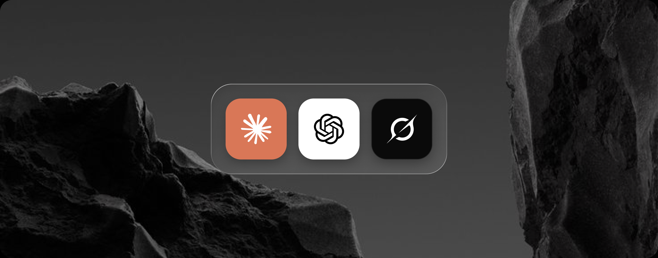 Claude, ChatGPT and Grok app icons side by side on a glass tray between dark rocks