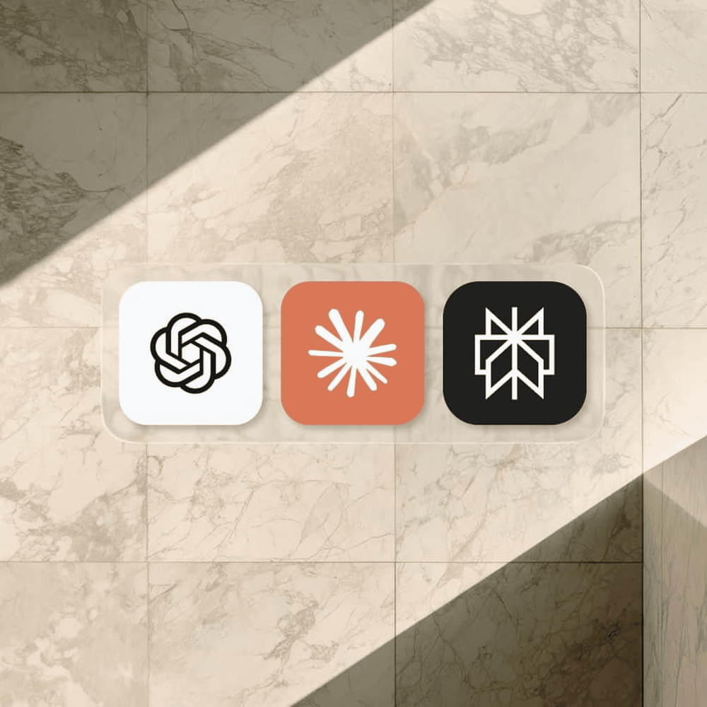 ChatGPT, Claude and Perplexity app icons on a marble wall